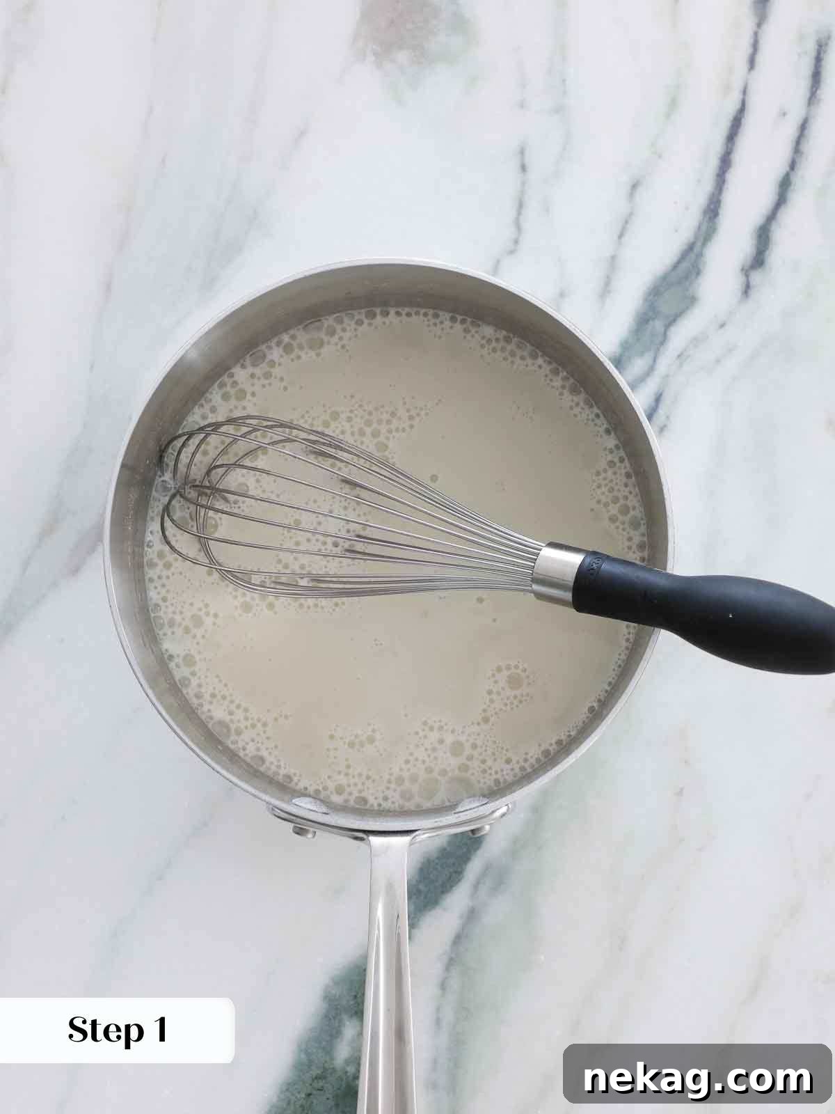 Velvety Cooked Flour Frosting 6 Dry ingredients being toasted in a saucepan for the cooked flour frosting base.