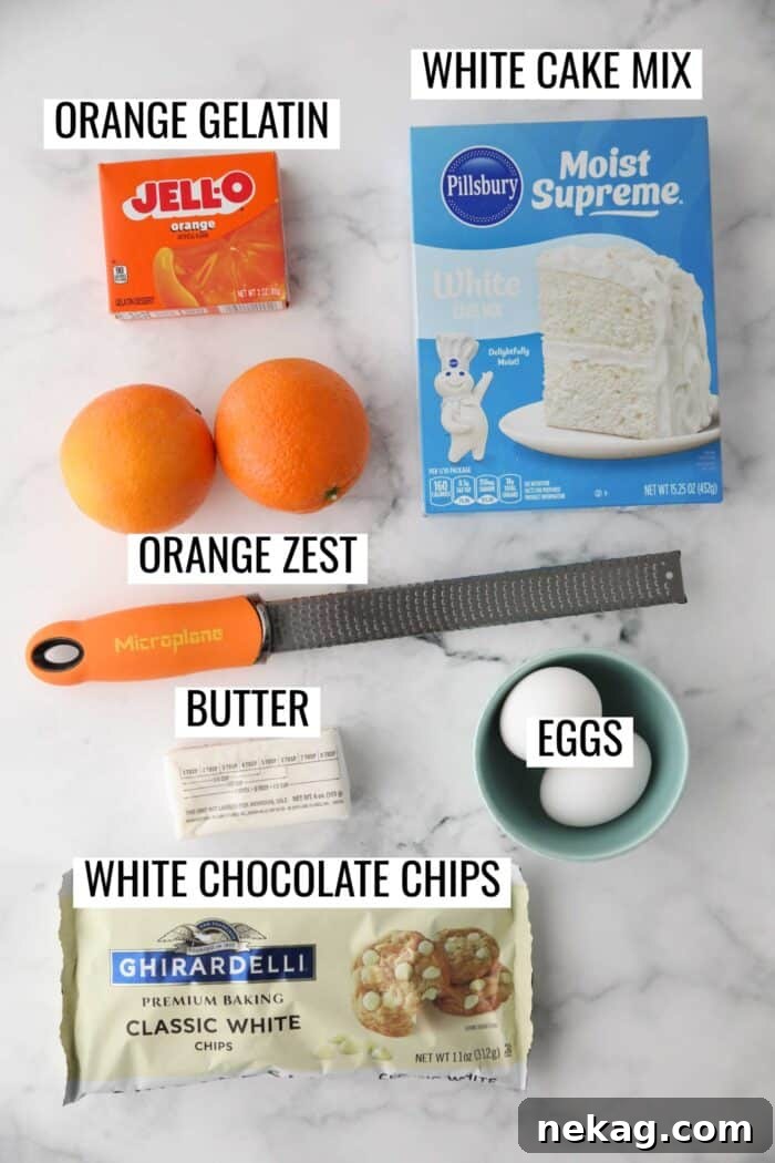 Orange Dreamsicle Delights 4 Clearly labeled ingredients laid out on a surface, showing everything required to make the orange creamsicle cookies recipe.