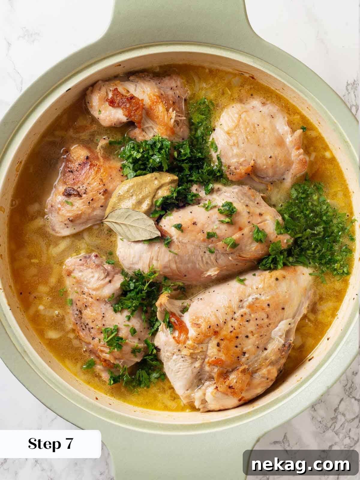 Chicken in wine sauce with an added bay leaf.