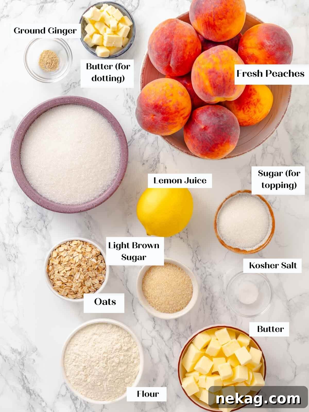 Warm Buttery Peach Crisp 4 Ingredients for homemade peach crisp laid out on a marble countertop, including fresh peaches, various sugars, oats, flour, and butter.