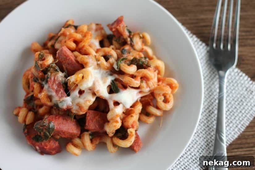 Close-up of baked Kielbasa Pasta Bake with melted cheese
