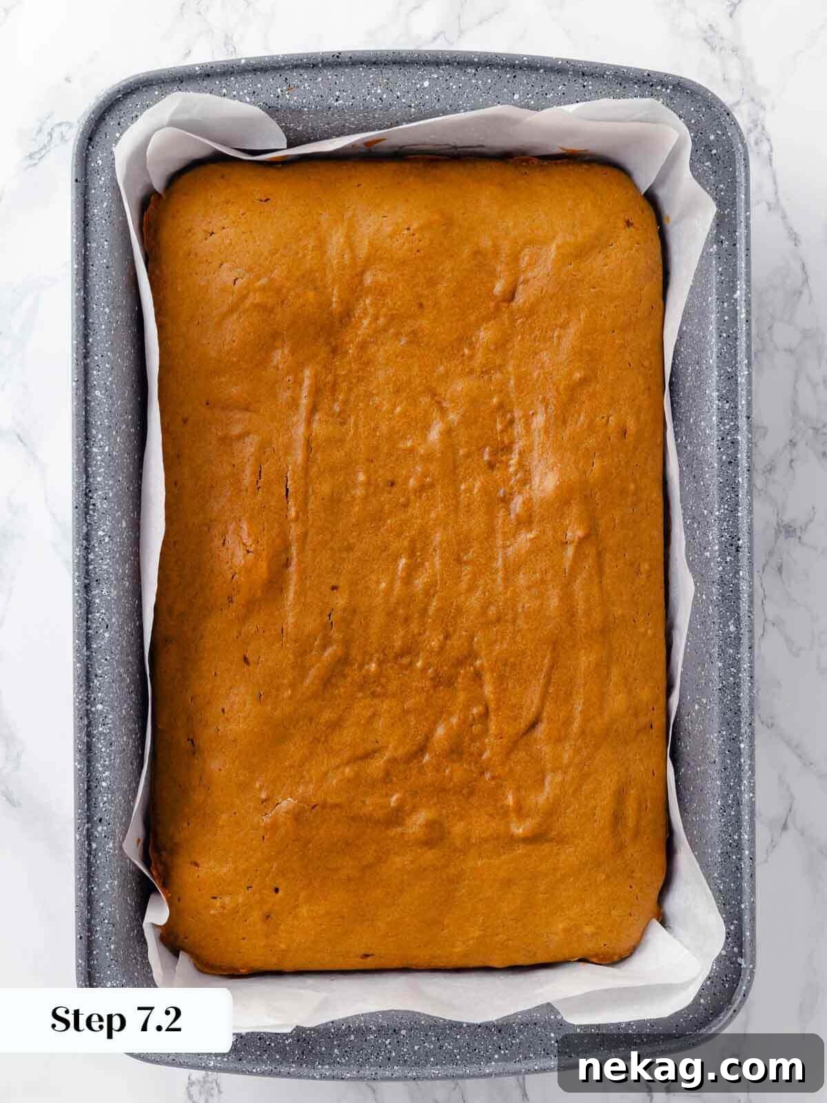 Autumn Spice Squares 11 Freshly baked pumpkin bars, unfrosted and unsliced, straight from the oven.