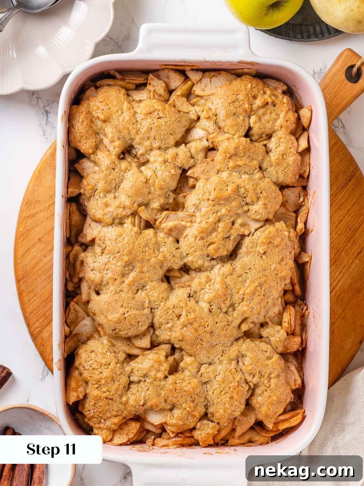 Fully baked apple cobbler, golden brown on top.