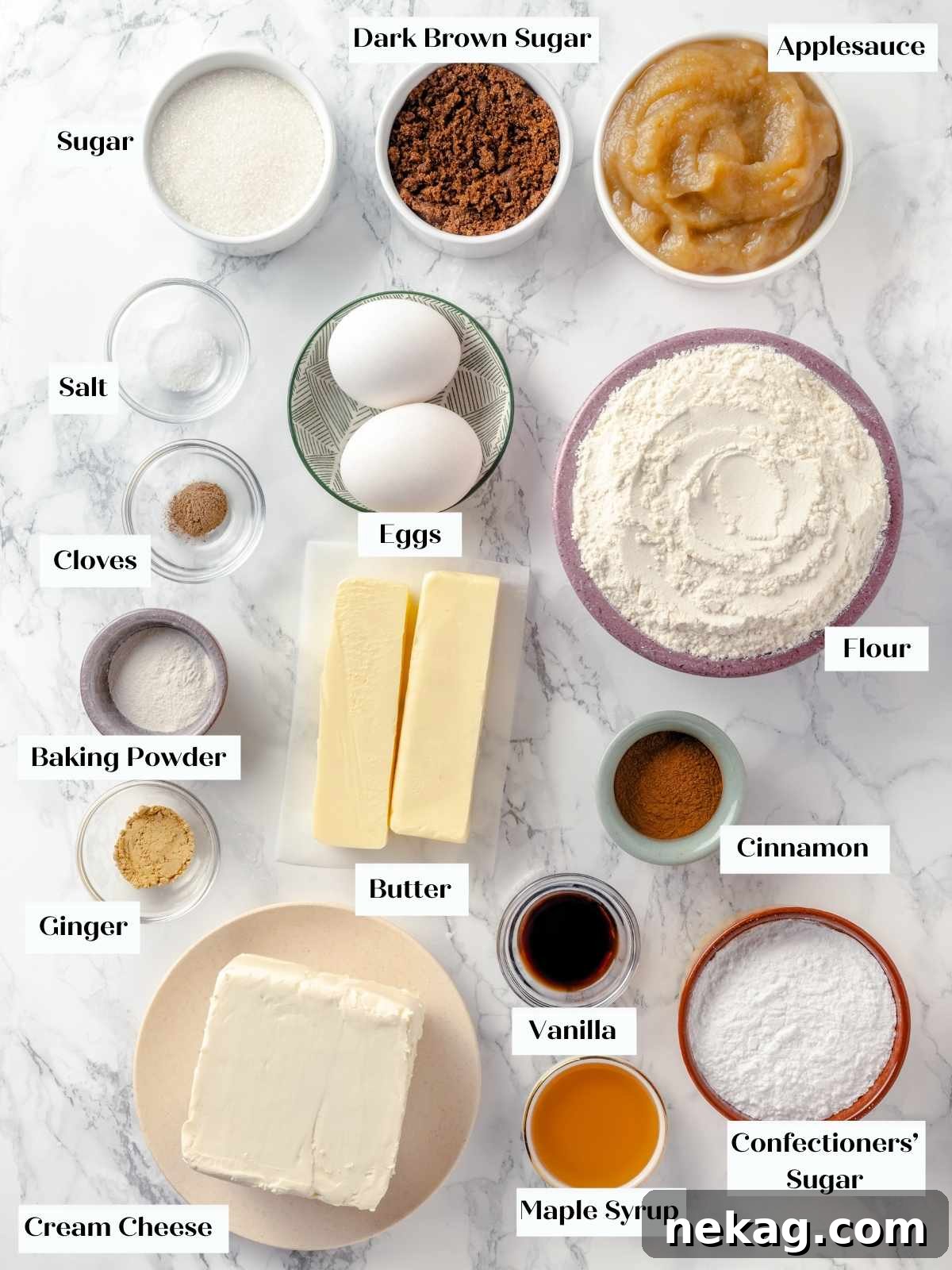 Spiced Applesauce Comfort Cake 3 Ingredients for applesauce cake, neatly arranged on a white marble countertop, ready for preparation.