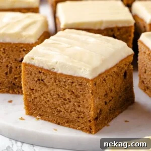 Applesauce cake displayed elegantly on a clean white countertop, ready to be enjoyed.