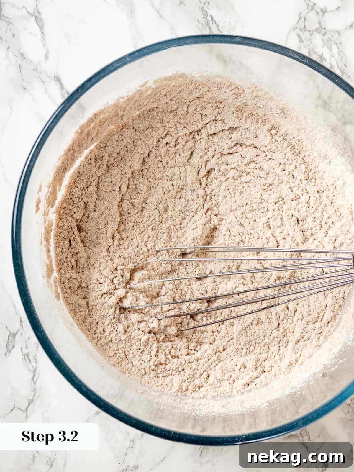 Flour mixture carefully prepared for sticky toffee pudding, showcasing the blend of dry ingredients.