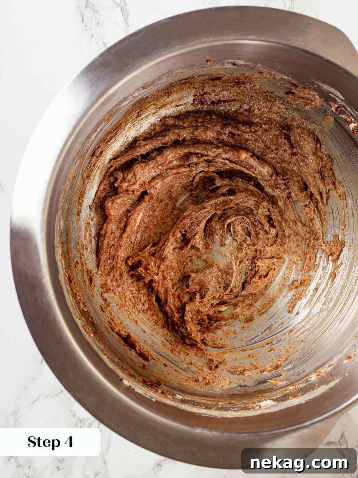 Creamed butter and molasses mixture forming the rich base for the sticky toffee pudding batter.