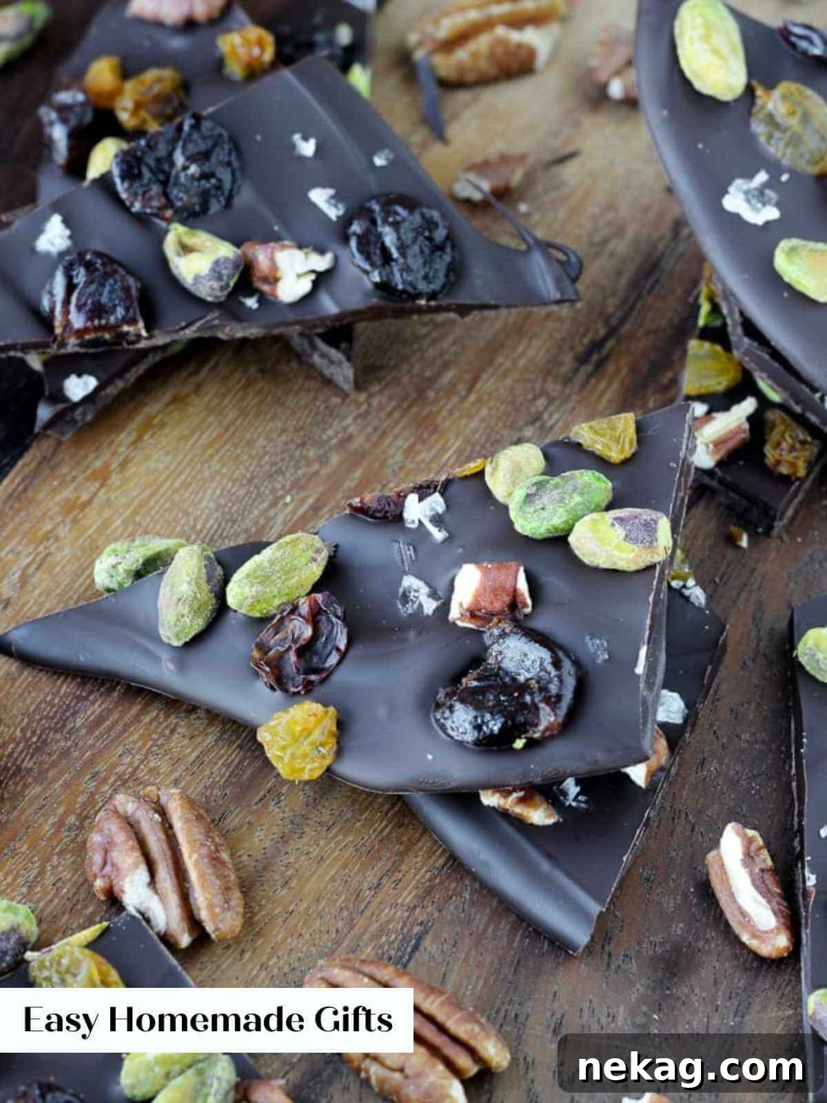 Handmade chocolate bark generously sprinkled with a delightful mix of nuts and dried fruits, perfect for homemade gifting.