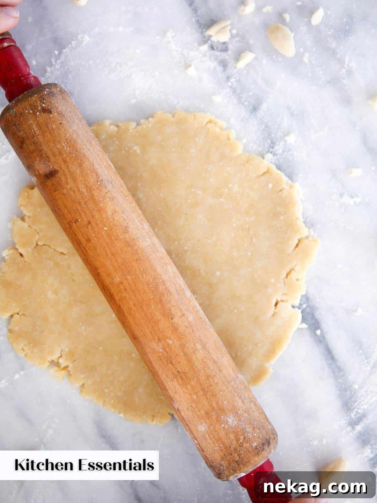 A elegant wooden rolling pin rests on a kitchen countertop, surrounded by dusting of flour and freshly prepared pie dough, symbolizing the craft of baking.