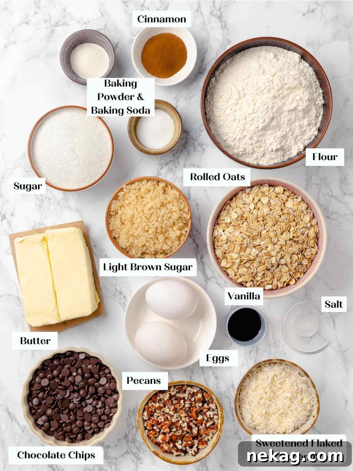 Hearty Cowboy Cookie Bake 4 A beautifully arranged flat lay of all the dry and wet ingredients needed for cowboy cookies on a pristine white marble countertop, perfectly organized and ready for mixing, highlighting freshness.