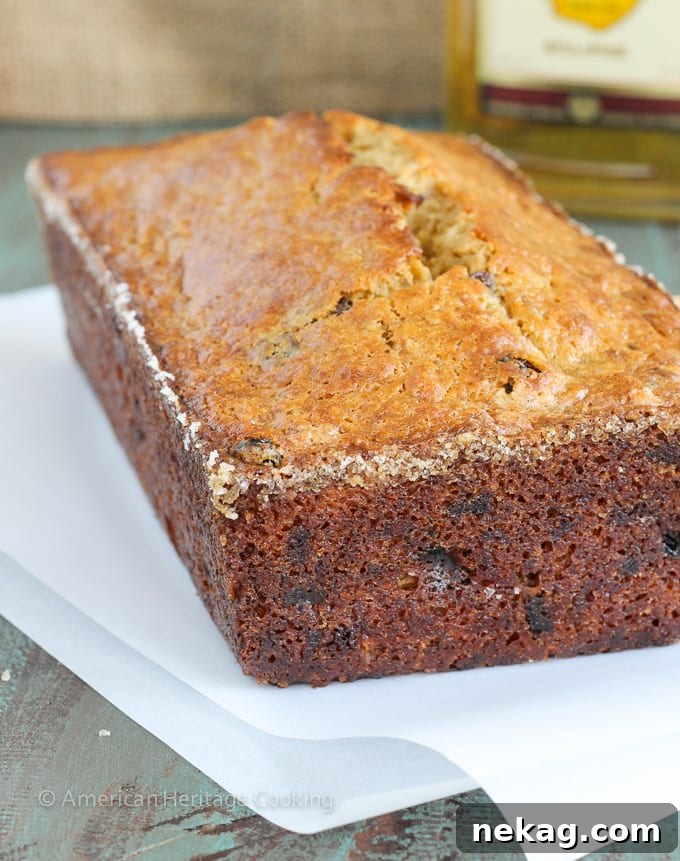 Decadent Brown Butter Rum Raisin Banana Bread 5 A close-up shot of the interior of the Brown Butter Rum Raisin Banana Bread, highlighting the soft texture and distribution of raisins.
