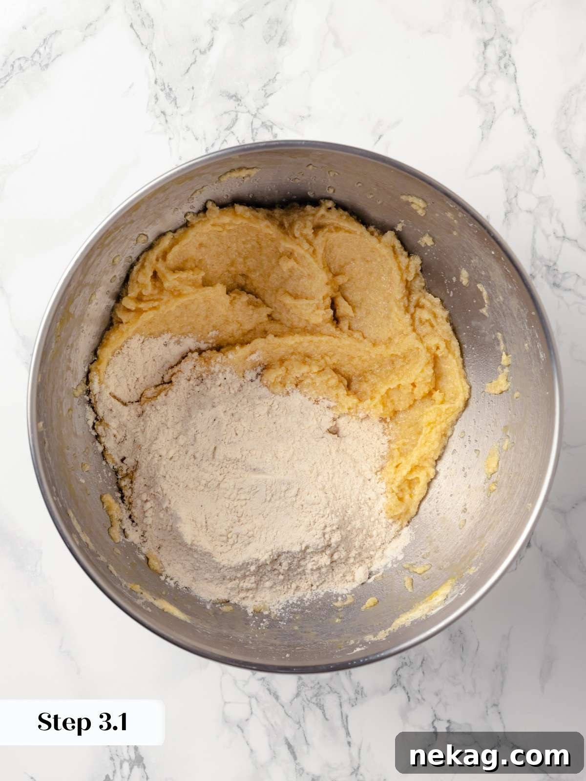Scooping cookie dough onto a baking sheet.