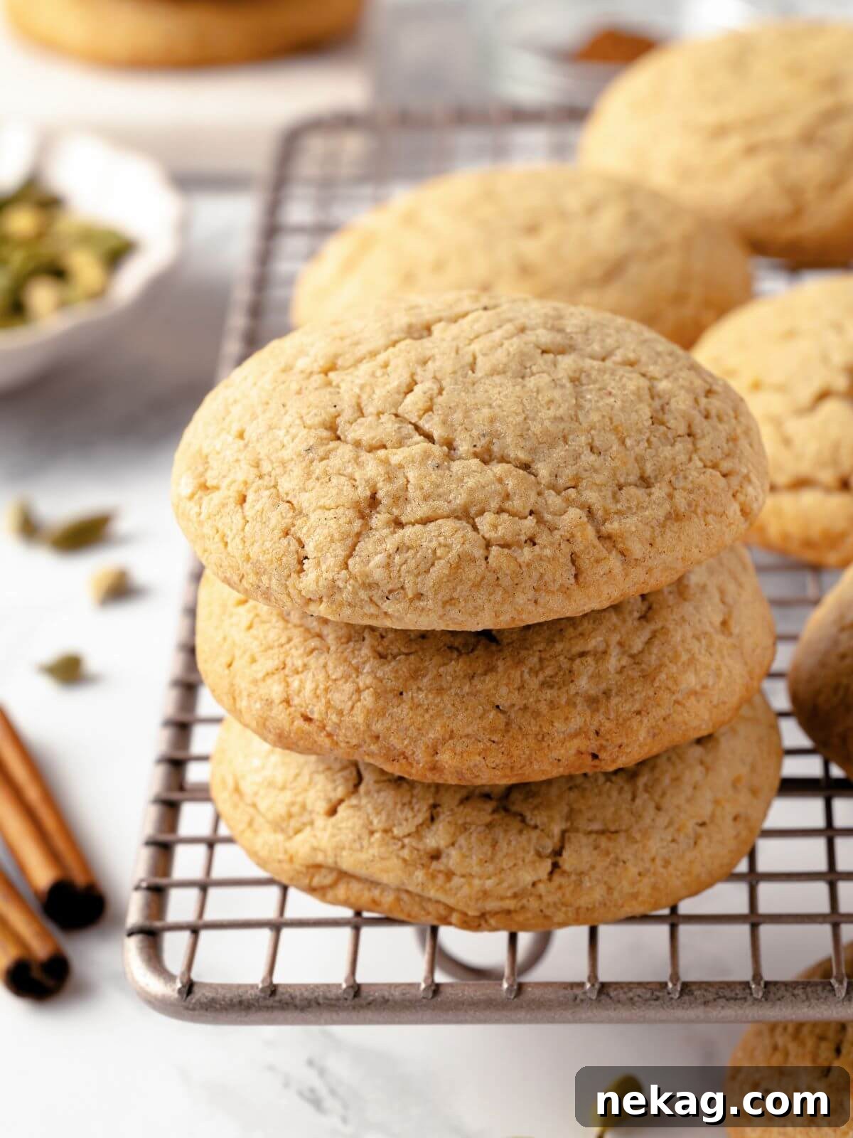 Chai sugar cookies arranged artfully on a plate, ready to be enjoyed.