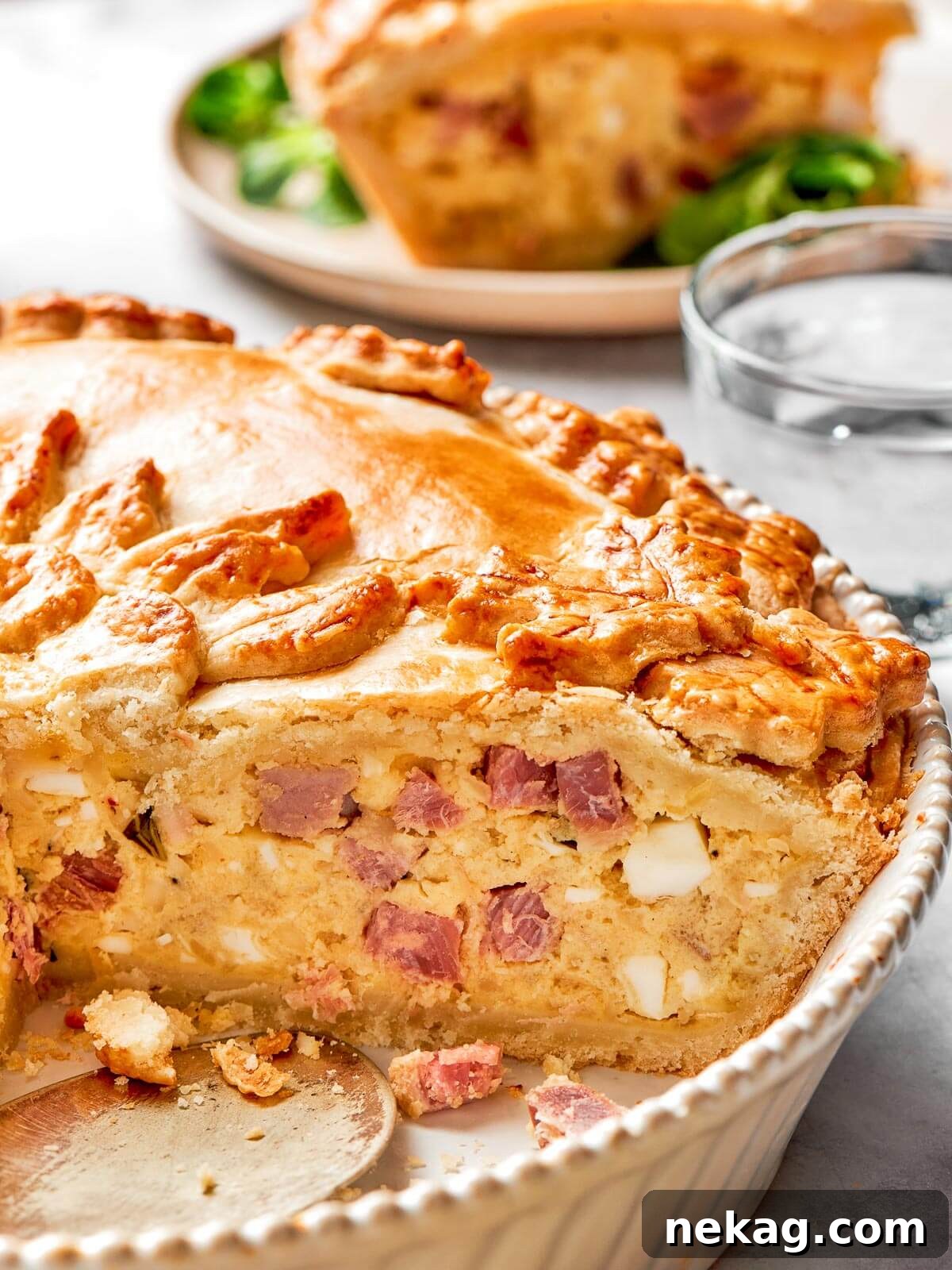 A close-up view of the rich, creamy, and savory ricotta filling, generously studded with delectable slices of soppressata and salami, ready to be baked to perfection.