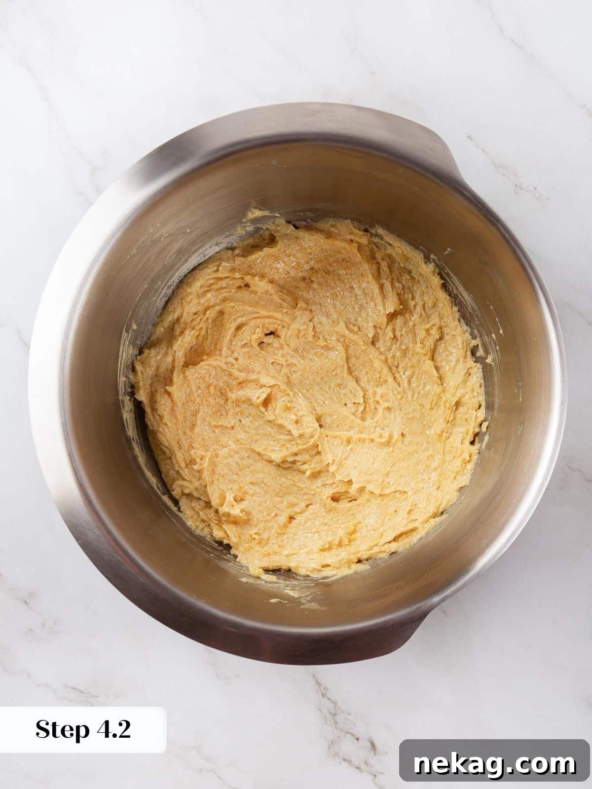 Smooth, lightened cookie dough after the egg has been thoroughly mixed in.