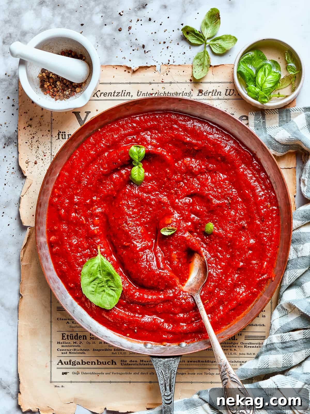 Close-up of velvety pizza sauce with a smooth, rich color, showcasing its luxurious texture.