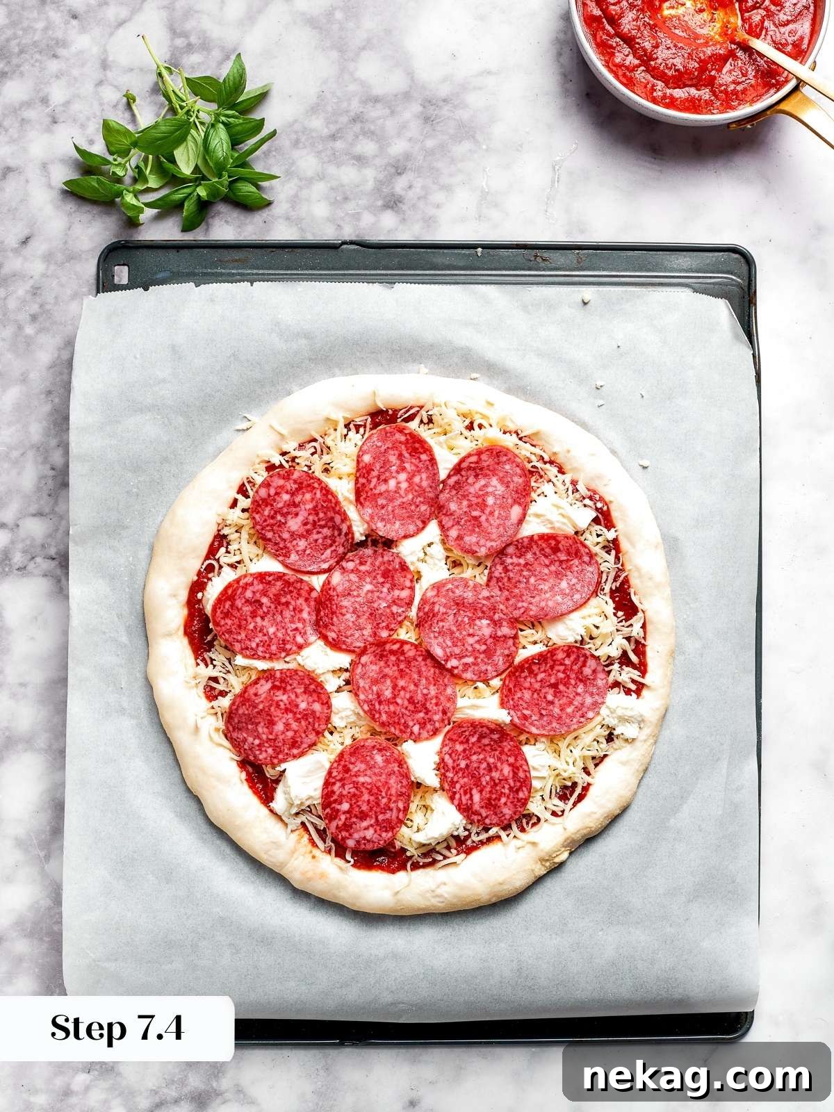 Carefully arranging pepperoni slices on top of the cheese layer, anticipating crispy, flavorful bites.