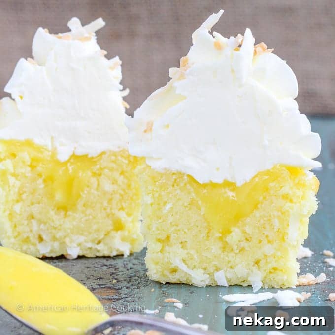 Lemon & Coconut Cloud Cupcakes 6 Beautifully piped Italian Meringue Buttercream on a lemon coconut cupcake, ready to be enjoyed.