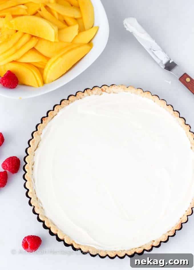 Sunshine Mango Coconut Tart 5 Slice of Coconut Mango Tart with visible coconut crust and creamy filling