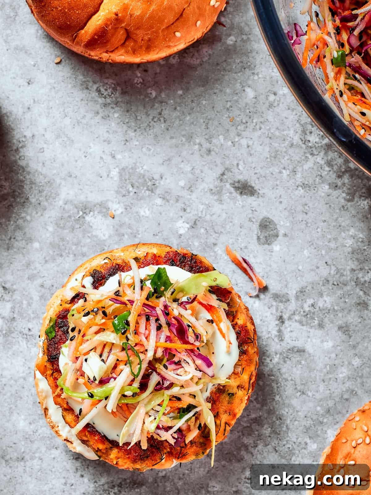 Fresh and Zesty Healthy Broccoli Slaw 7 Tangy sesame broccoli slaw layered over a juicy burger for a crunchy, refreshing topping.