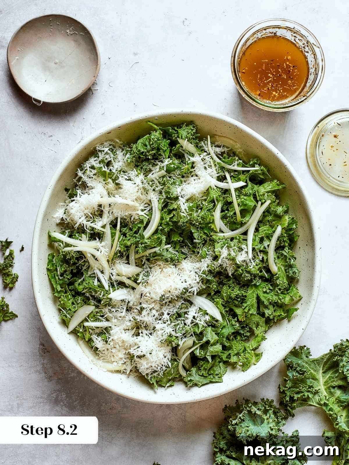 Fresh parmesan cheese added to Tuscan kale salad for a salty, rich finishing flavor.