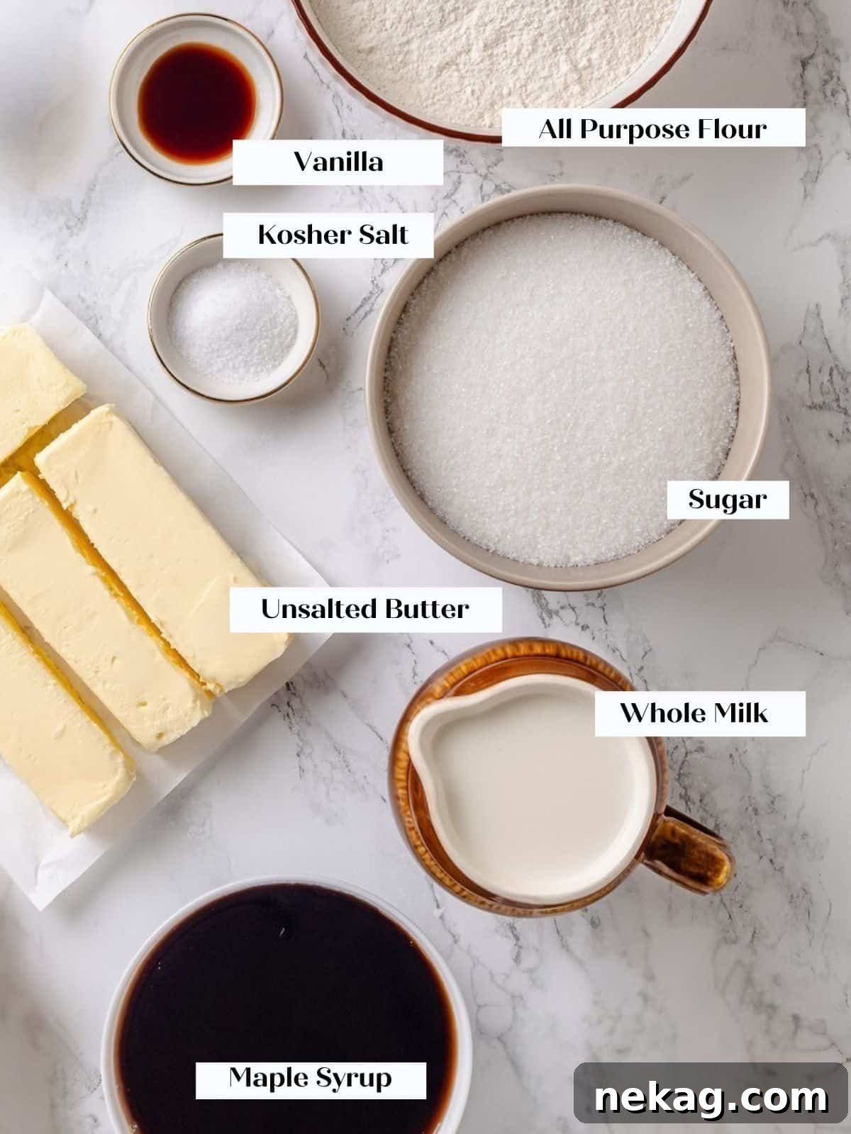 Velvet Maple Glaze 3 Ingredients for maple frosting, including flour, sugar, milk, and syrup, neatly arranged on a countertop.