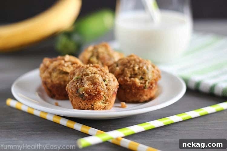 A tray of freshly baked Banana-Zucchini Mini Crumb Muffins