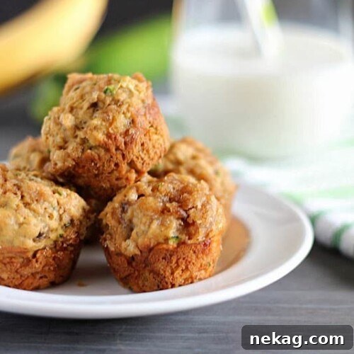 Healthy Banana-Zucchini Mini Crumb Muffins with a bite taken out