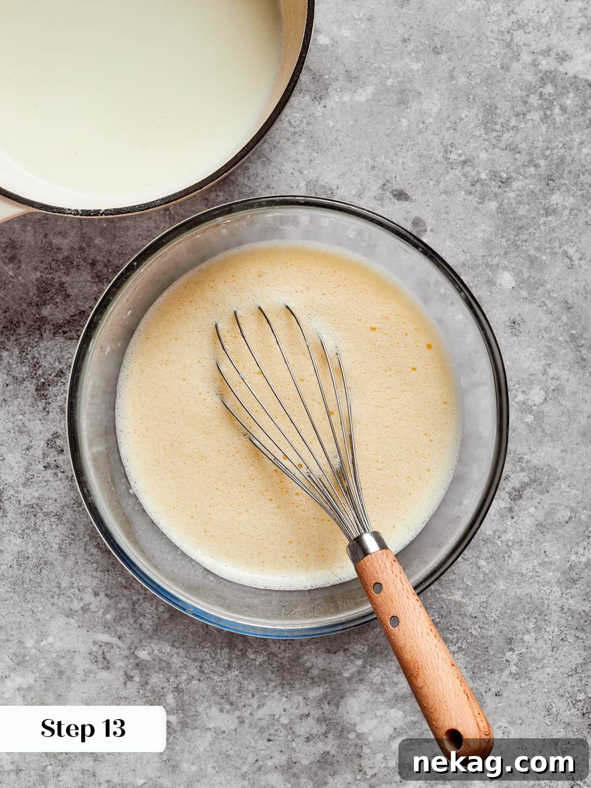 Delicate Layered Crepe Dessert 12 Slowly adding warm milk to eggs to prevent curdling during the pastry cream process.