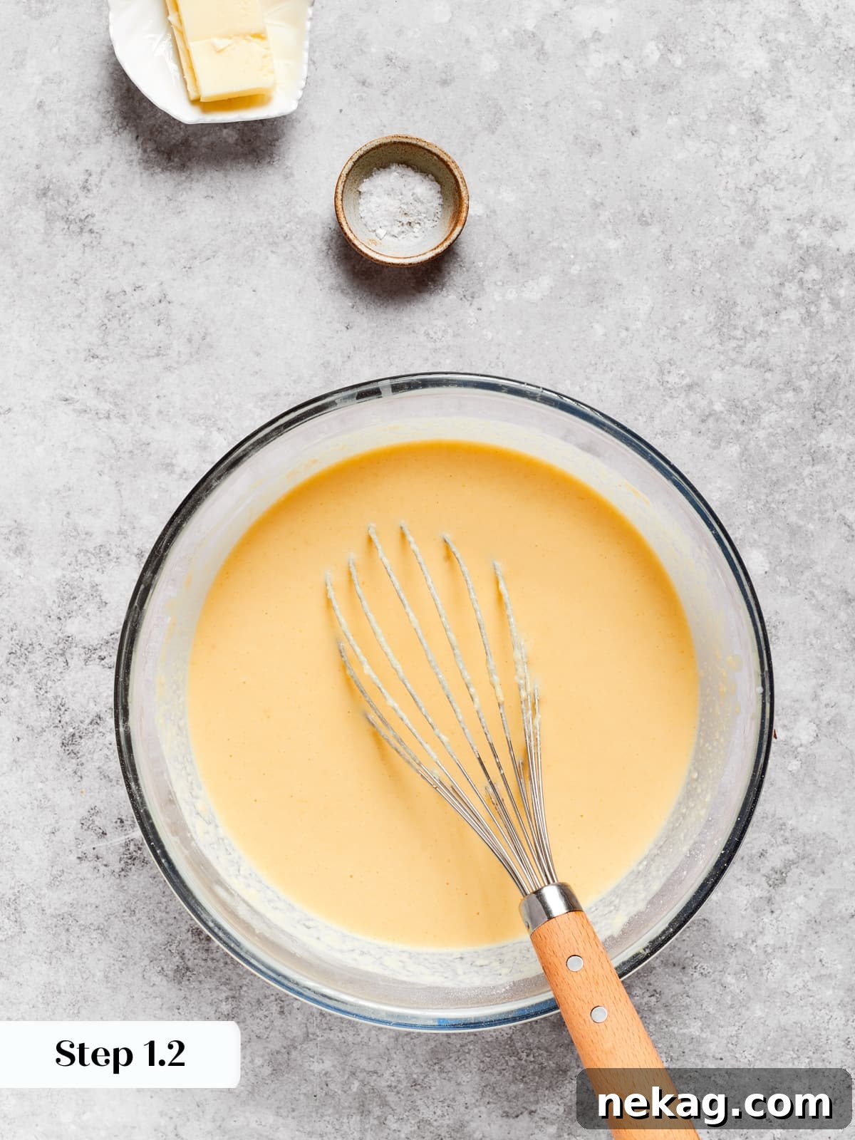 Delicate Layered Crepe Dessert 7 Freshly mixed crepe batter sitting in a bowl with a smooth texture ready for cooking.