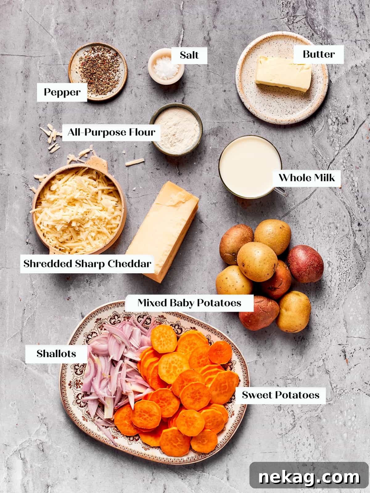Ingredients for scalloped potatoes arranged on countertop before starting recipe.
