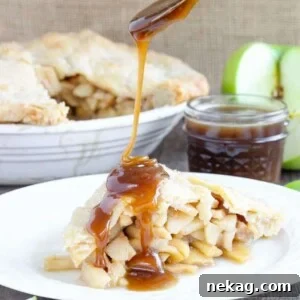 A beautiful Butterscotch Apple Pie with a perfectly browned and crimped crust, ready for serving.