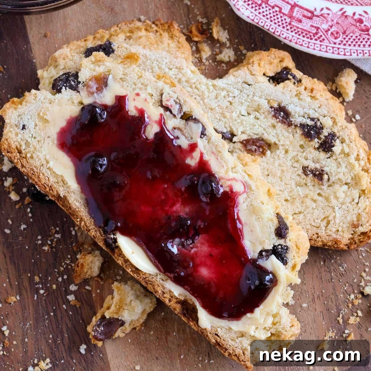 Emerald Isle Raisin Loaf 4 Two pieces of warm Irish soda bread, generously spread with Irish butter and a vibrant fruit jam.