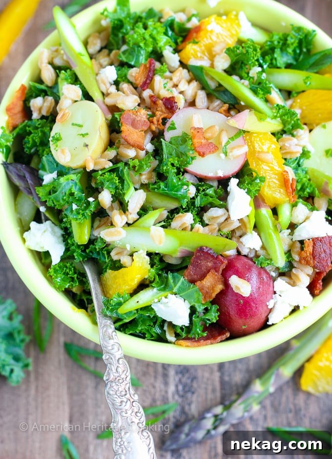 Orange-Kissed Asparagus Farro Salad for Spring 3 Close-up view of the Asparagus Orange Farro Salad, highlighting the crisp green asparagus, golden farro, and colorful new potatoes.