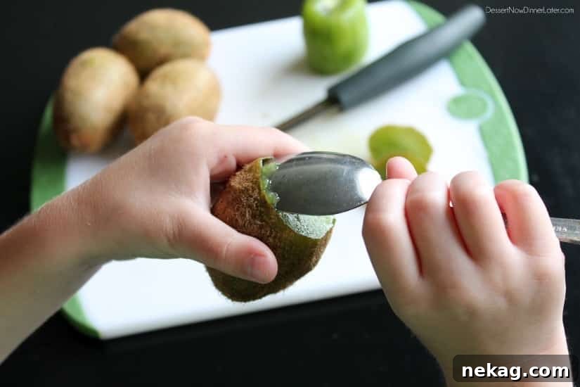 Spoon Magic: Flawless Kiwi Peeling 4 How to Peel a Kiwi with a Spoon: Inserting the Spoon
