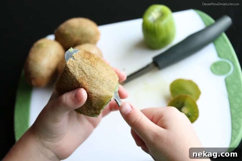 Spoon Magic: Flawless Kiwi Peeling 6 How to Peel a Kiwi with a Spoon: Rotating to Remove Skin