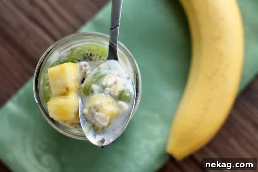 Paradise Overnight Oats 6 Multiple jars of Tropical Overnight Oats lined up, showcasing a healthy meal prep idea.