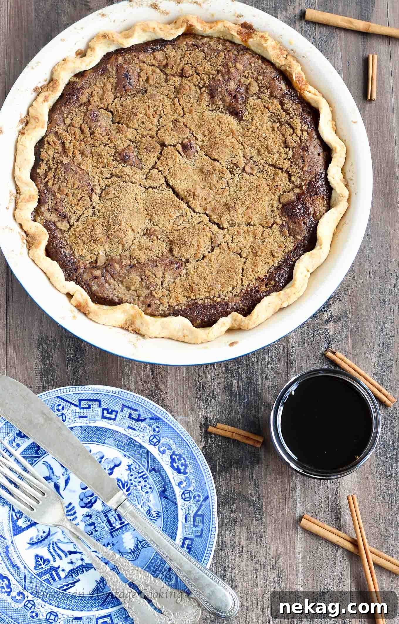 Old-Fashioned Molasses Crumble 4 A whole Shoofly Pie cooling on a wire rack, its golden-brown streusel topping perfectly baked.