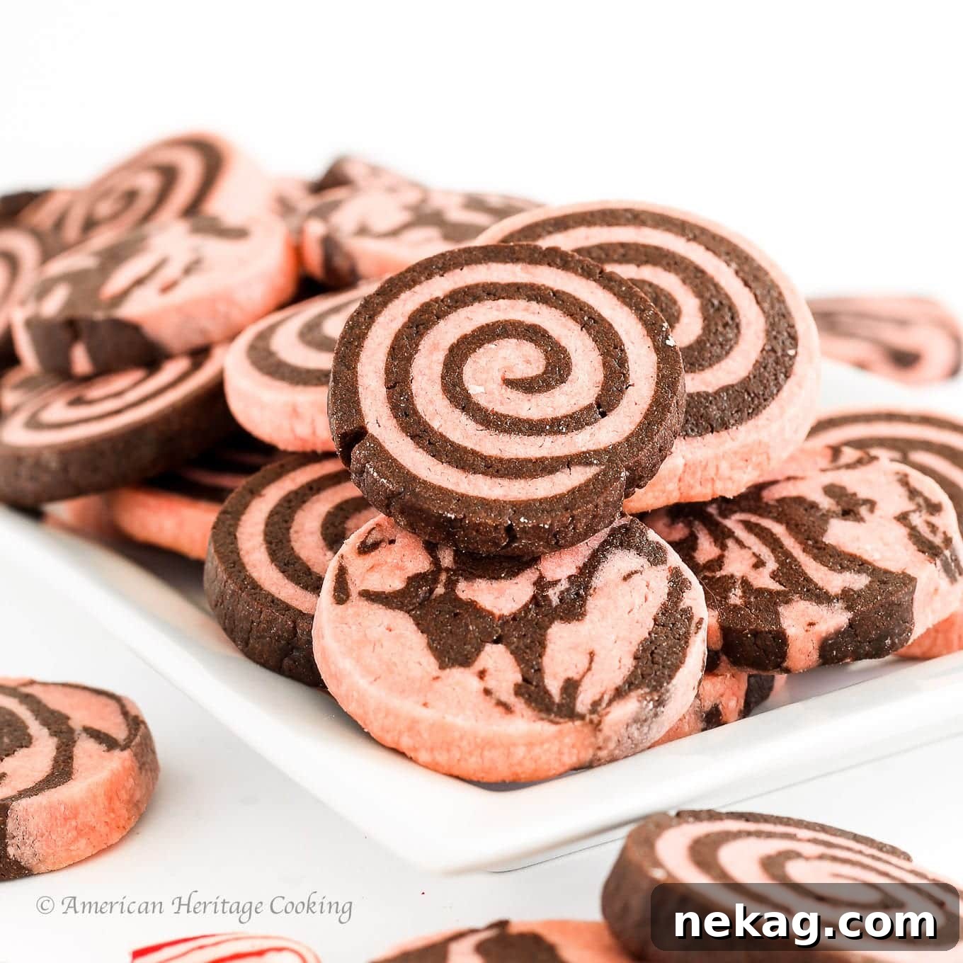 Close-up of freshly baked Chocolate Peppermint Sugar Cookies, showcasing the beautiful swirl pattern.