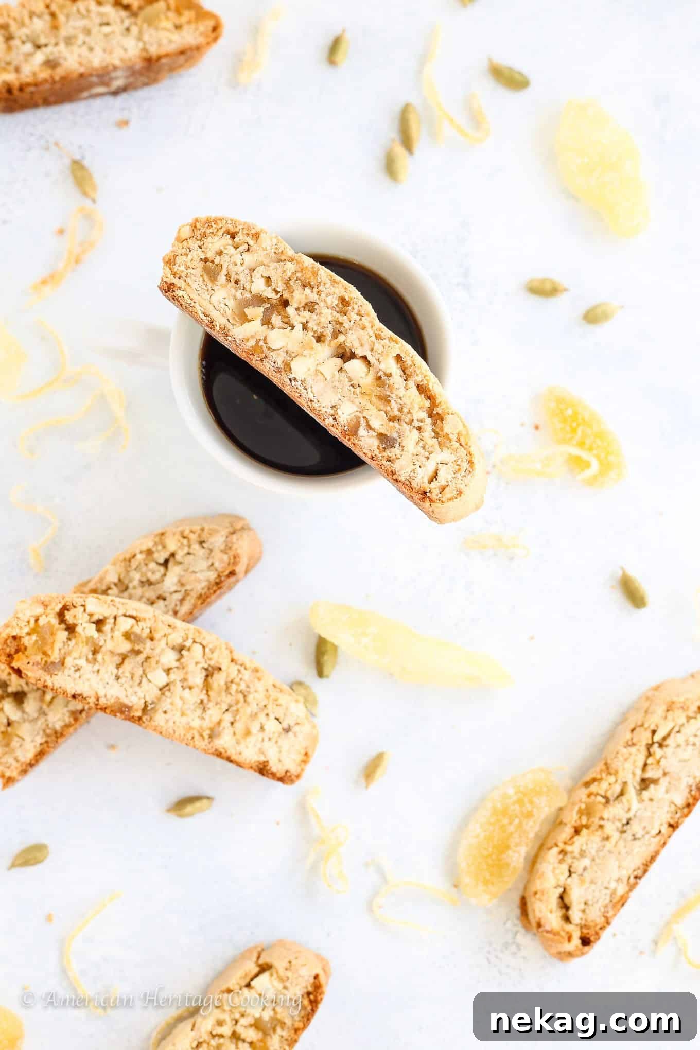 Hand holding a Ginger Orange Almond Biscotti.