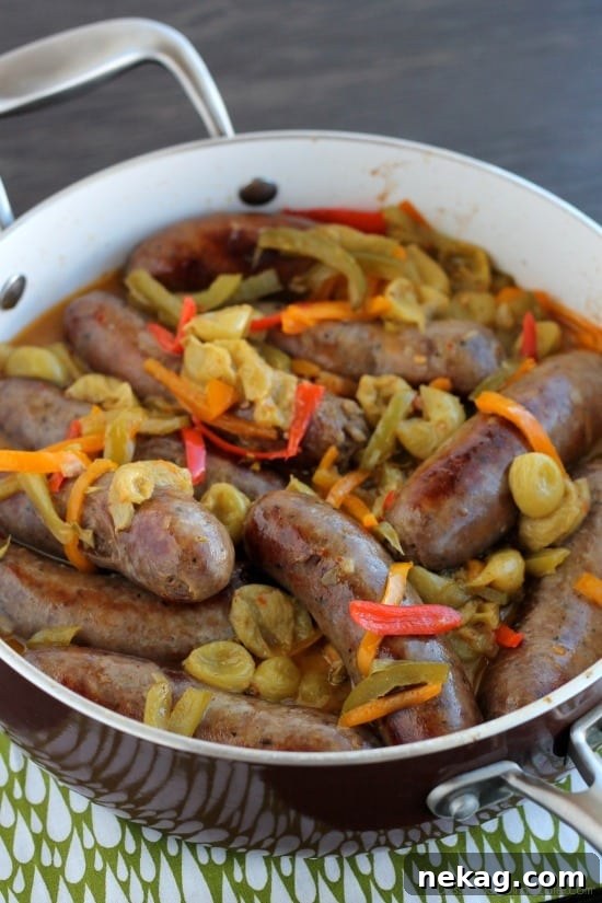 Grape Glazed Italian Sausage with Peppers 3 Close-up of golden brown Italian Sausages with Peppers and Grapes