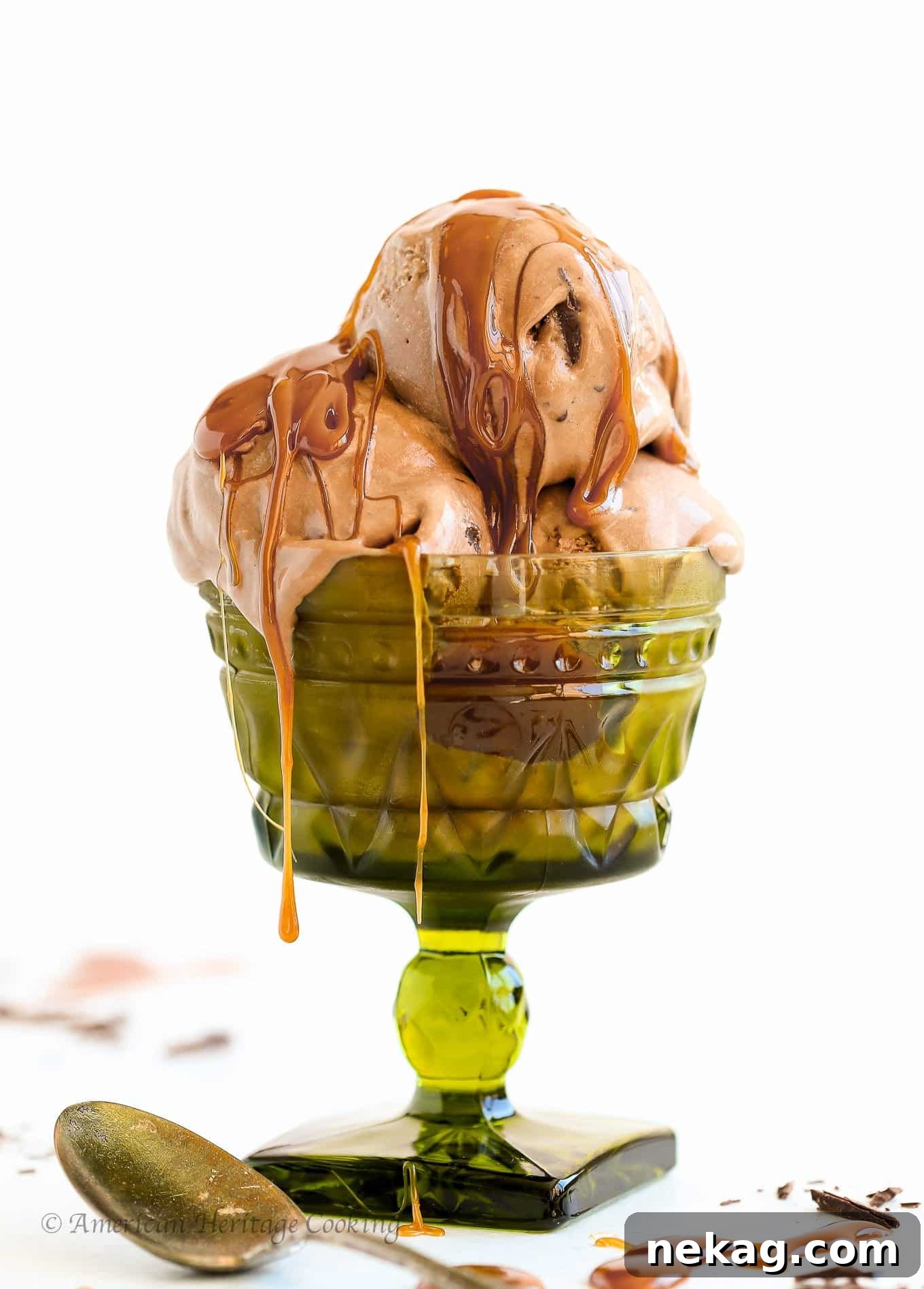 Scoop of Double Chocolate Caramel Ice Cream in a bowl, showcasing rich chocolate and golden caramel swirls, garnished with chocolate shavings.