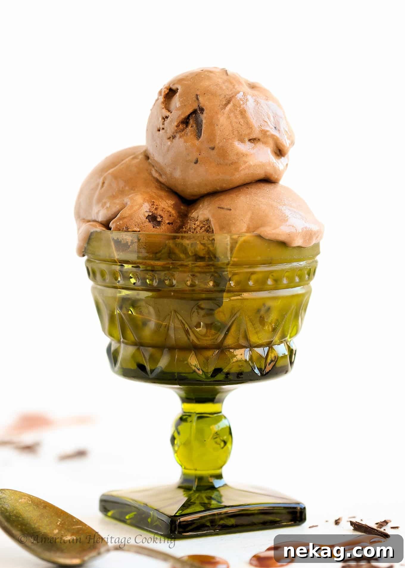 A close-up of a serving of Double Chocolate Caramel Ice Cream, artfully presented with extra chocolate and caramel drizzle.