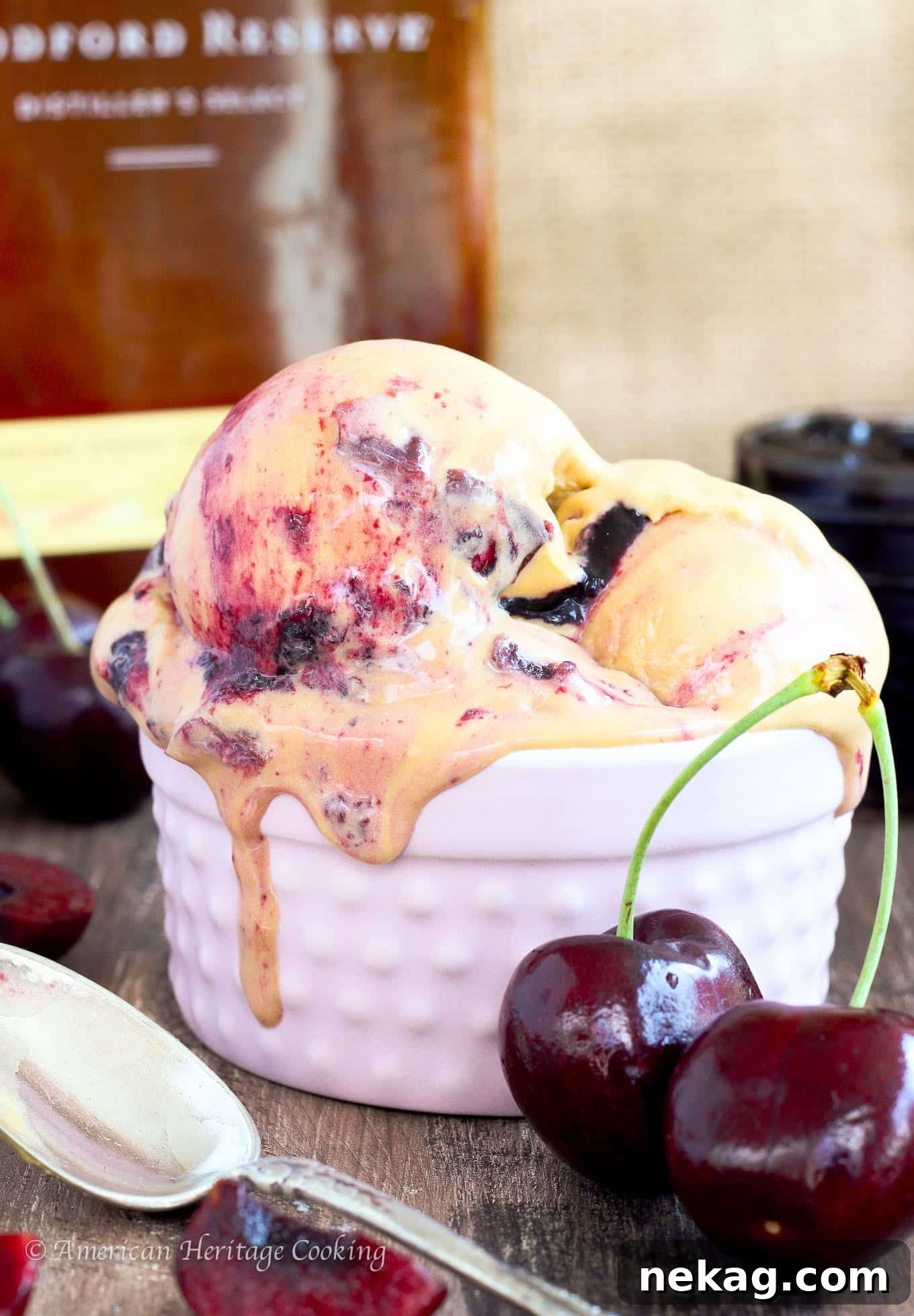 This Bourbon Cherry Caramel Ice Cream is a smooth, rich caramel ice cream with a homemade cherry jam swirl and Bourbon soaked cherries! 