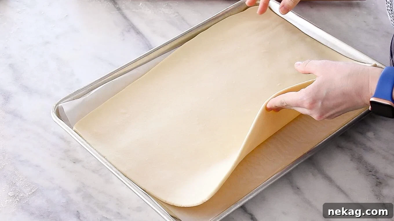 Two rectangular sheets of inverse puff pastry dough, perfectly rolled out and ready for use
