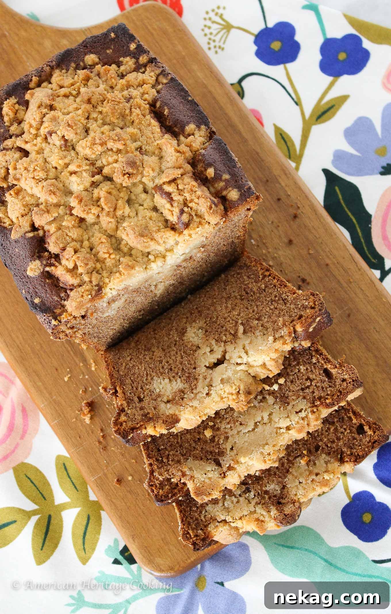 Delicious slice of cinnamon banana crumb bread with streusel topping, perfect for breakfast or dessert.