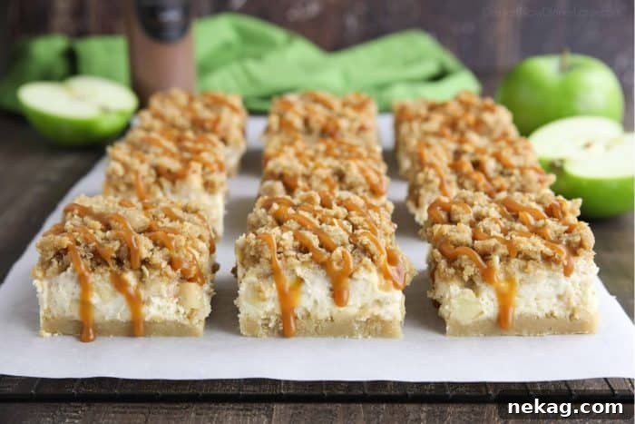 Irresistible Caramel Apple Cheesecake Bars 7 Close-up of caramel dripping down the sides of freshly sliced apple cheesecake bars, inviting a delicious bite.