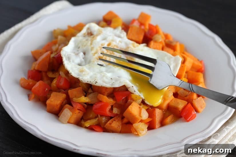 Cooked Sweet Potato Hash in a large pan, ready to be served
