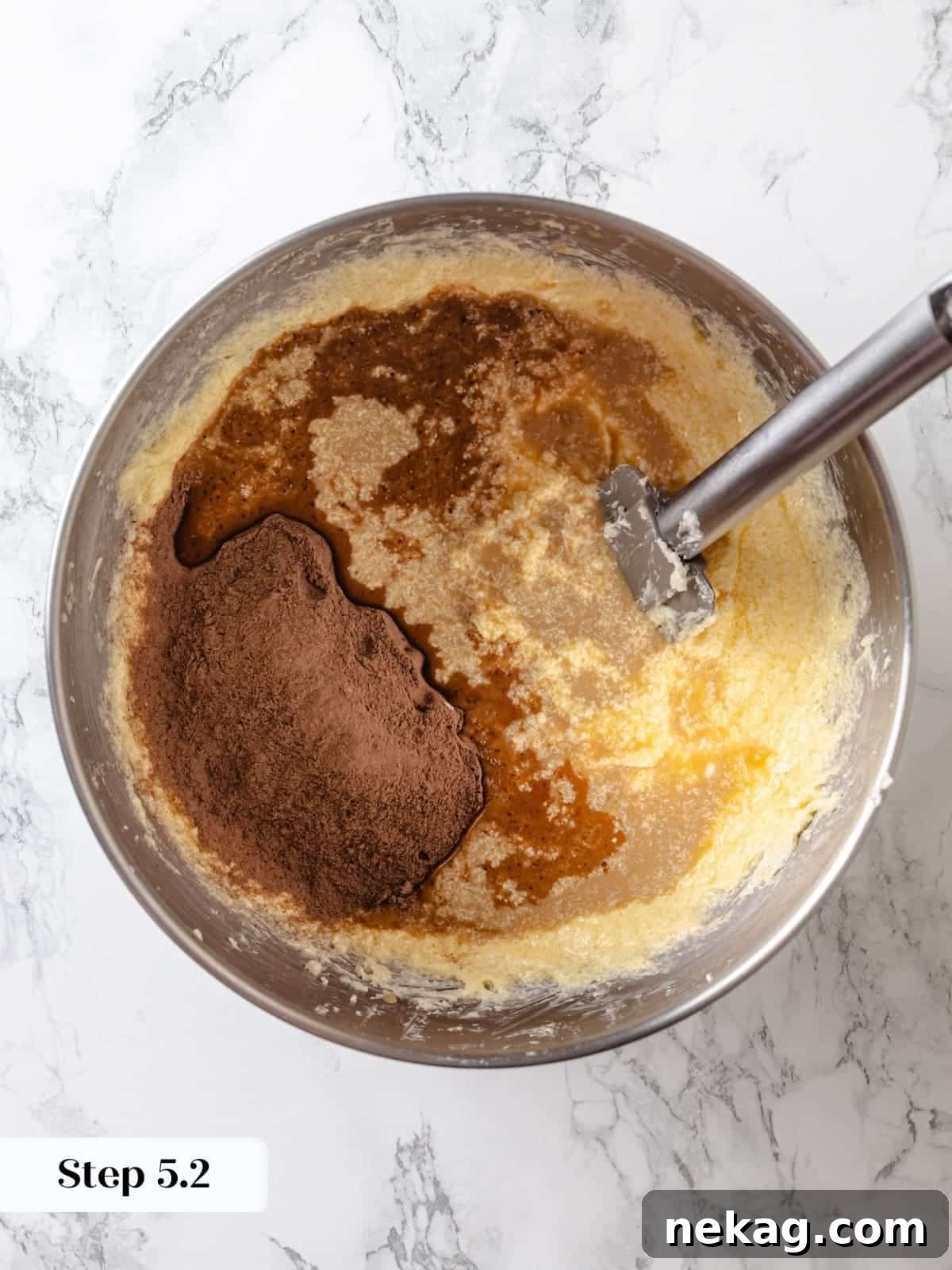Sinfully Rich Chocolate Cake 11 The sifted flour and cocoa blend is being gently added to the wet mixture, gradually forming the rich Devil’s Food Cake batter.