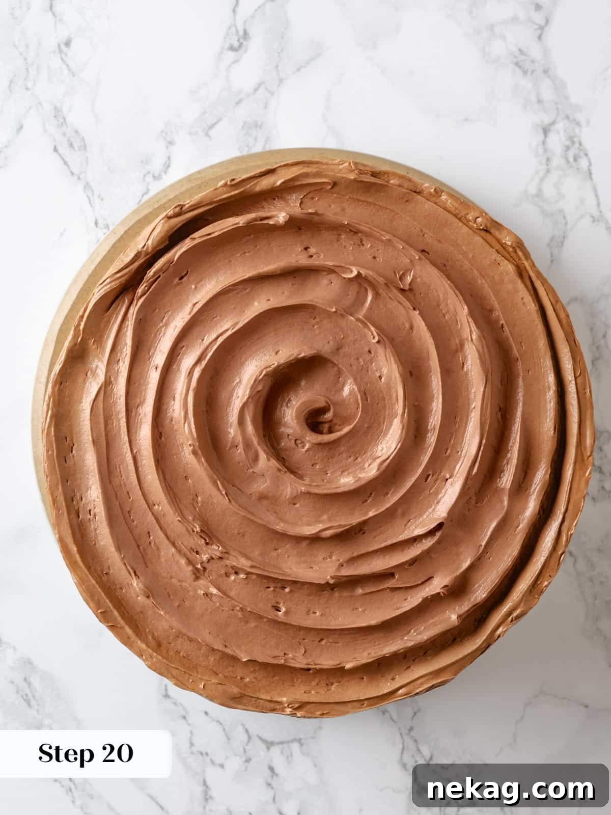 Sinfully Rich Chocolate Cake 24 The top of the Devil’s Food Cake is exquisitely finished with an elegant swirl pattern, meticulously created using the soft, creamy frosting.
